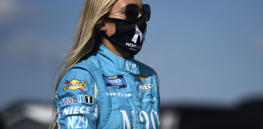 SPARTA, KENTUCKY - JULY 11: Natalie Decker, driver of the #44 N29 Capital Partners Chevrolet, walks on the grid prior to the NASCAR Gander RV &amp; Outdoors Truck Series Buckle Up In Your Truck 225 at Kentucky Speedway on July 11, 2020 in Sparta, Kentucky. (Photo by Jared C. Tilton/Getty Images)