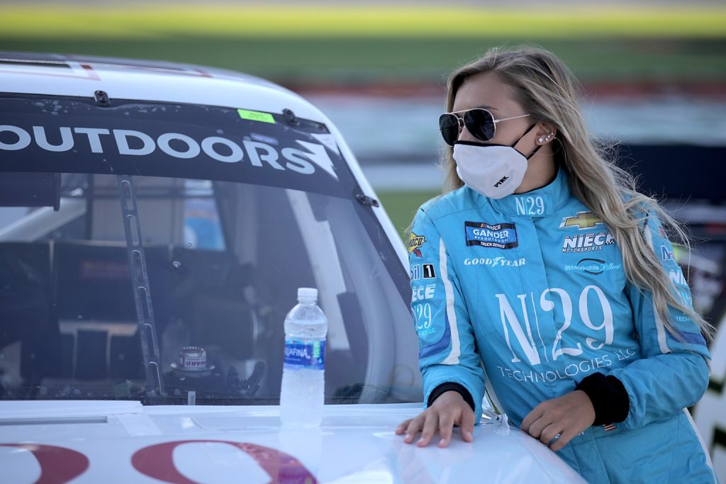 FORT WORTH, TEXAS - JULY 18: Natalie Decker, driver of the #44 N29 Capital Partners Chevrolet, stands on the grid prior to the NASCAR Gander RV &amp; Outdoors Truck Series Vankor 350 at Texas Motor Speedway on July 18, 2020 in Fort Worth, Texas. (Photo by Chris Graythen/Getty Images)